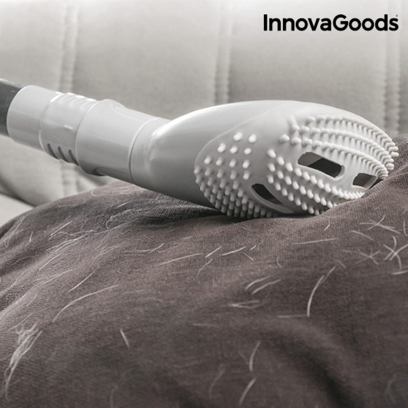Brosse aspirateur anti-poils retirant des poils de chien